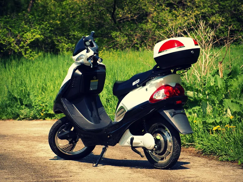 Scooter 125 cm³ avec top-case, حالة جيدة